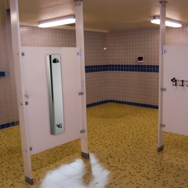 indoor push button shower panel at a commercial gym main