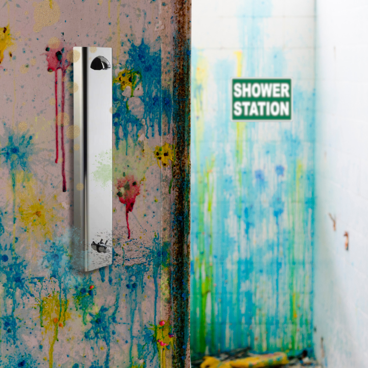 Time adjustable metered shower panel in a paintball facility main