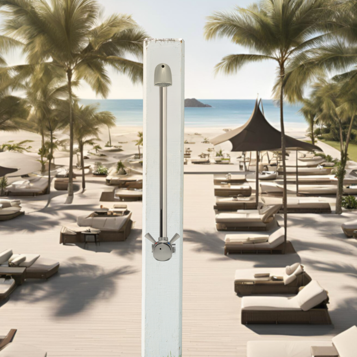 exposed outdoor time and temperature adjustable shower valve with anti-ligature shower head at a resort / hotel beach